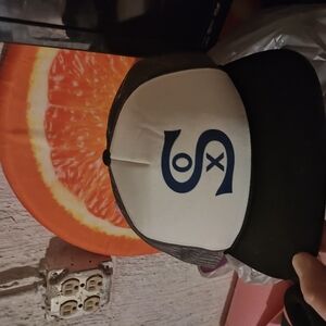 Black and White Trucker Hat with Blue Logo